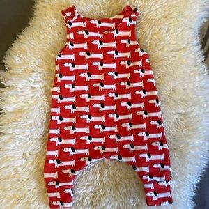 Red baby jumper with white dogs, cotton. 0-3 months